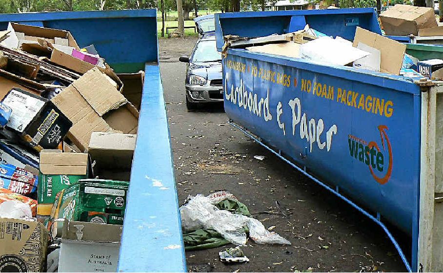 NOT HAPPY: The current recycling depot outside the Lismore Shopping Square. INSET: Zadoc Street resident Patricia Del Rocio and landowner Bruce Saltmarsh inspect the site where Lismore City Council plans to construct a drive-in recyclables collection depot. NOT HAPPY: The current recycling depot outside the Lismore Shopping Square. INSET: Zadoc Street resident Patricia Del Rocio and landowner Bruce Saltmarsh inspect the site where Lismore City Council plans to construct a drive-in recyclables collection depot.